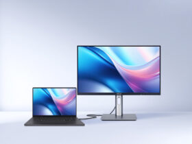 ront view of the ASUS ProArt professional monitor connected to a MacBook Pro via USB-C, demonstrating the M Model P3 color matching feature for creative professionals.