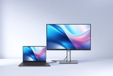 ront view of the ASUS ProArt professional monitor connected to a MacBook Pro via USB-C, demonstrating the M Model P3 color matching feature for creative professionals.