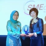 Dato Hafsah Hashim CEO SME Corp receiving a token of appreciation from Serene Sia MD SAP Malaysia after delivering the keynote address at the SAP SME Summit 20121 |