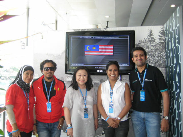 In the photo: Joanne Foo, General Manager, Marketing, LG Electronics (M) Sdn Bhd (Center) shares the joy with a few Paddock Club winners - Anandth Duvvuri (right) and Norastura binti Mamat (left) and their spouses through WIN BIG with LG.